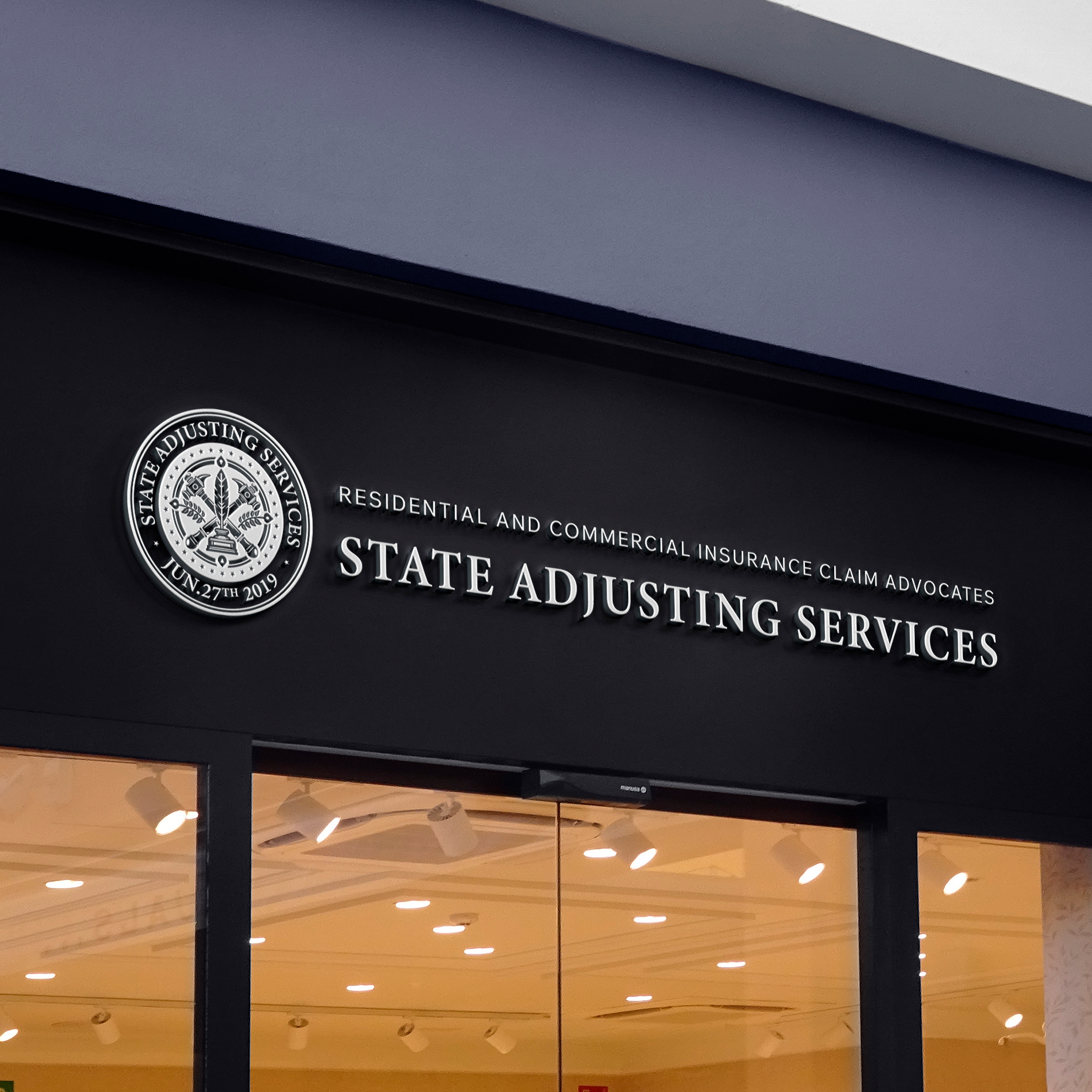 State Adjusting Services logo on the wall.jpg